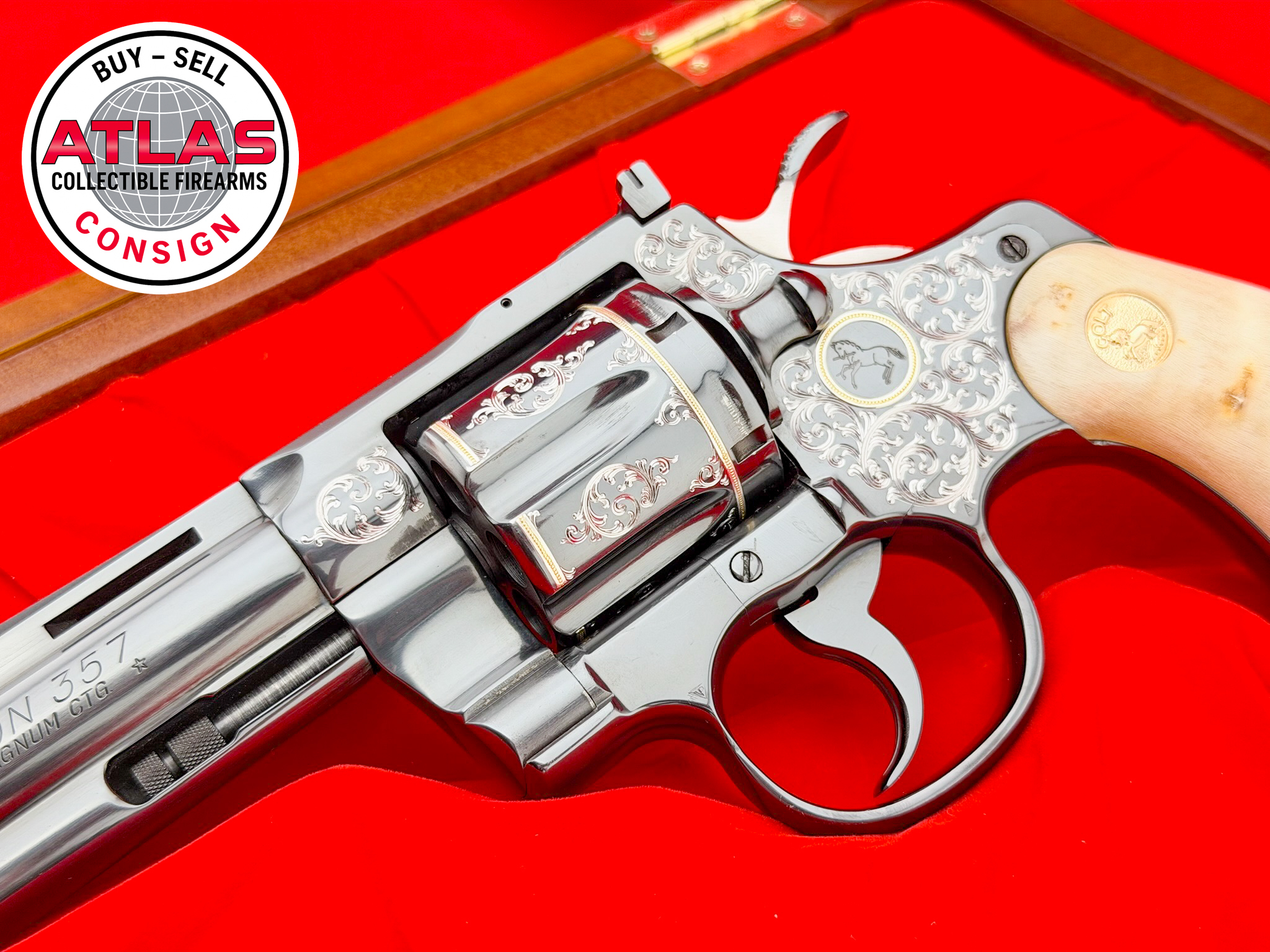 Colt-MASTER ENGRAVED 1976 COLT PYTHON 4" ROYAL BLUE .357 MAGNUM W/ RAMS HORN-4" Royal Blue; master engraved; ram horn grips