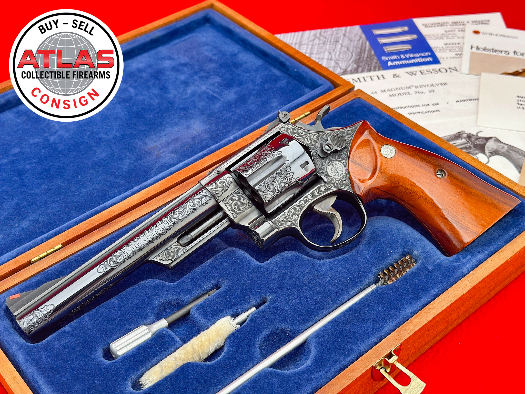 Smith & Wesson-HOLY GRAIL 1977 S&W 29-2 RARE 6.5" Blue .44 Magnum FACTORY ENGRAVED / NOS
RARE CLASS "A" ENGRAVING - ORIGINAL MAHOGANY CASE-Factory Engraved 1977 6.5-Inch Blue, NOS / Unfired, Original Mahogany Case